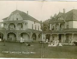 old photo of tourists in Jackson's Point outside accommodation